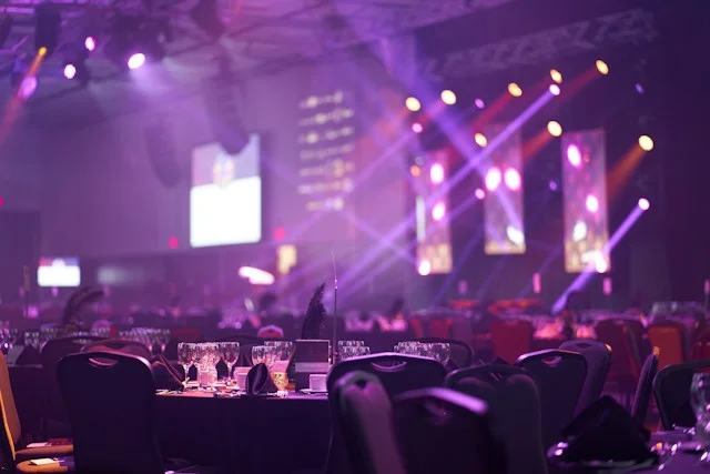 Casino-inspired candlelight, glassware, and decorative accents for an evening event